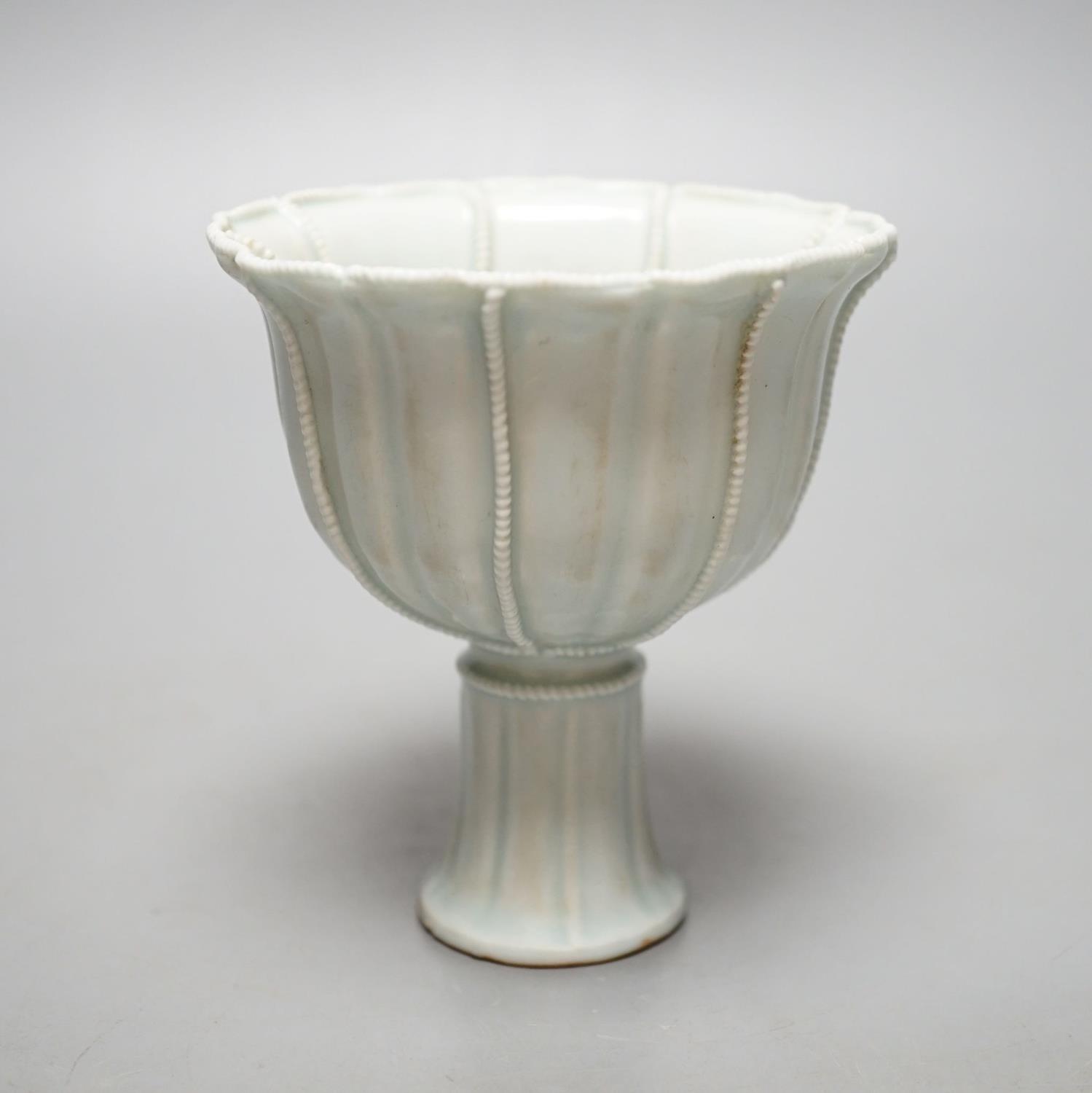 A Chinese Qingbai type stem cup.10 cms high.