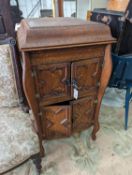 An early 20th century oak gramophone case (no record player), width 55cm, depth 60cm, height 102cm