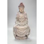 A Chinese carved wood figure of Guanyin, 35cm