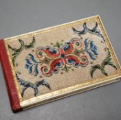 An Austrian beadwork cover souvenir album of watercolours and Berlin woolwork.15 cms wide.