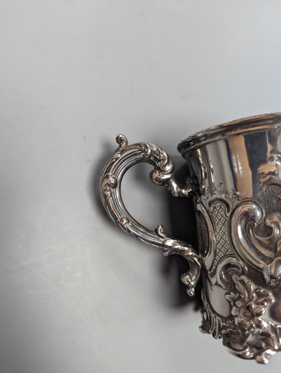 A Victorian embossed silver christening mug, decorated with roses amid scrolls, The Barnards, - Image 2 of 2