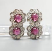 A pair of cabochon garnet and diamond set double cluster earrings (lacking butterflies), 14mm, gross