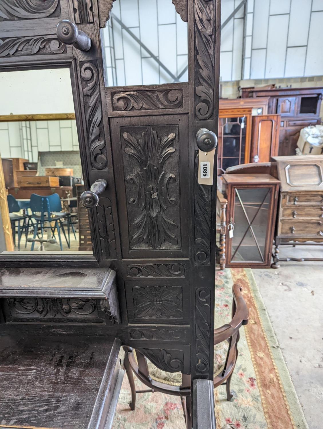 A late Victorian carved oak hall stand, width 102cm, depth 34cm, height 188cm - Image 2 of 2