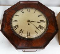 An early 19th century mahogany octagonal wall clock, 47cm