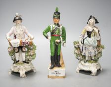 A pair of Dresden porcelain figures of a street-trader and companion and a continental porcelain