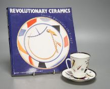 Russian Suprematist-style coffee cup and saucer, 20th century, together with a volume of