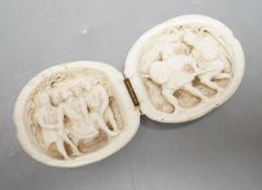 A 19th century Dieppe ivory carving, folding in two sections, 10cm. max. width