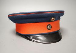 An Imperial German Prussian reservist peaked cap