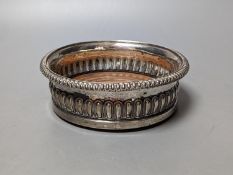 A George III demi fluted silver mounted wine coaster, John Roberts & Co, Sheffield, 1812, diameter