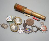 A group of medals and objects of vertu, four-draw telescope,19 cms long, fully drawn.