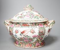 A large Chinese famille rose vase and a similar tureen and cover,vase 63 cms high.