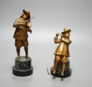 A pair of gilt spelter figures of magicians.19 cms high.