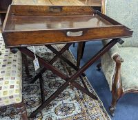 A Victorian rectangular mahogany butler's tray on folding stand, width 74cm, depth 50cm, height