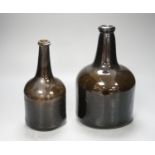 Two mid 18th century glass mallet-shape wine bottles, tallest 27cm