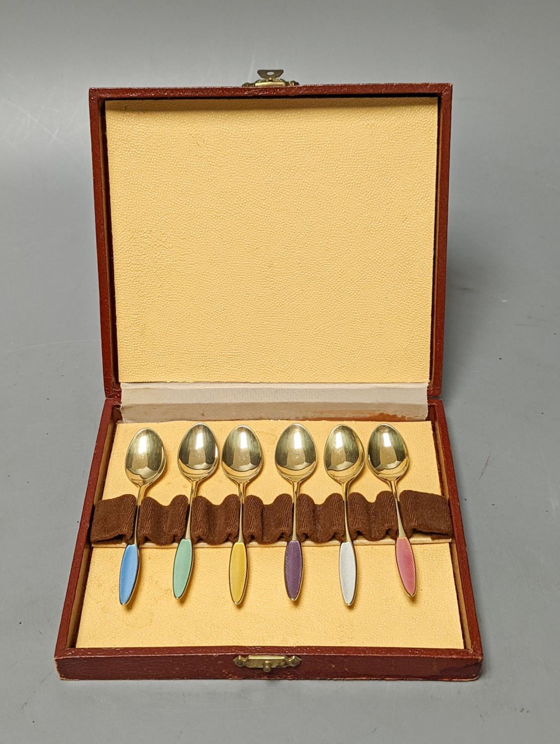 A cased set of six Danish Fricast gilt sterling and enamel coffee spoons. - Image 2 of 2