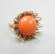 A modern yellow metal and button shaped coral bead set dress ring, size L, gross weight 13.4 grams.