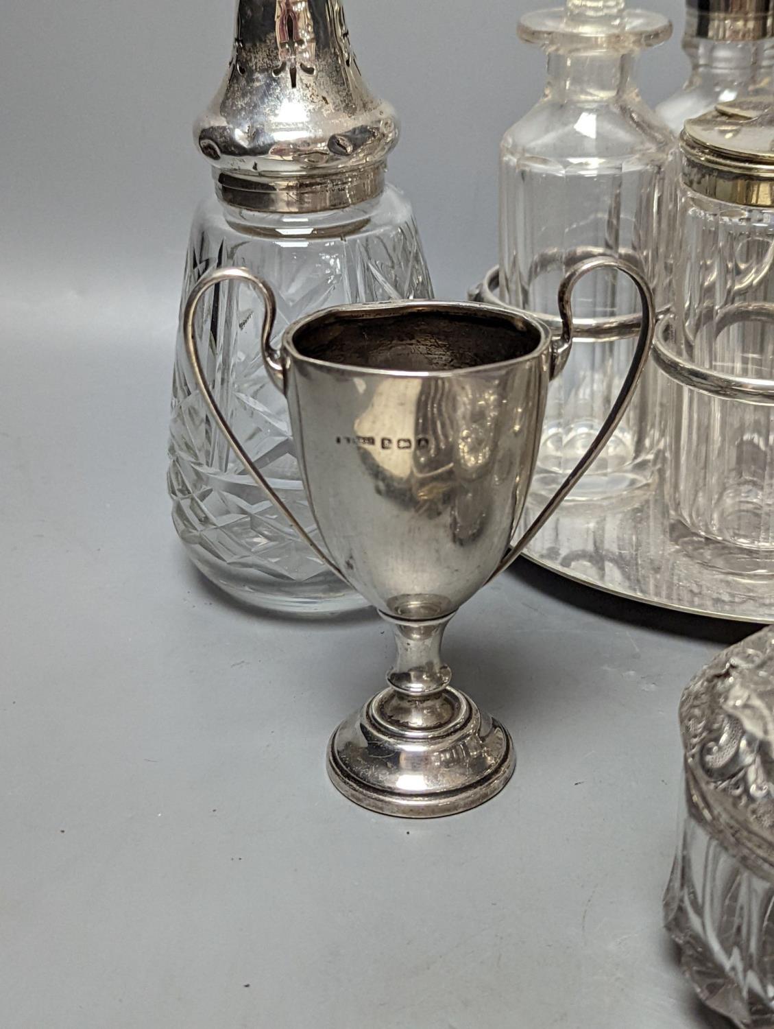 A plated cruet stand, two cased sets of silver handled tea knives, a silver domed ashtray(a.f.) - Image 2 of 2