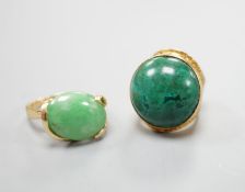 A modern 14k yellow metal and cabochon malachite set dress ring, size F and a similar cabochon