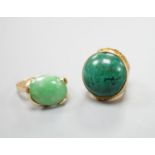 A modern 14k yellow metal and cabochon malachite set dress ring, size F and a similar cabochon