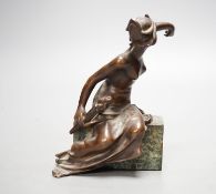 An Art Deco bronze semi-nude seated female,13 cms high.