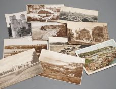 Four albums of postcards and a large collection of loose postcards, mainly British topographical,