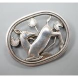 A Georg Jensen sterling 'kneeling deer' oval brooch, no. 256.