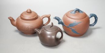 Three Chinese Yixing teapots, tallest 10cm