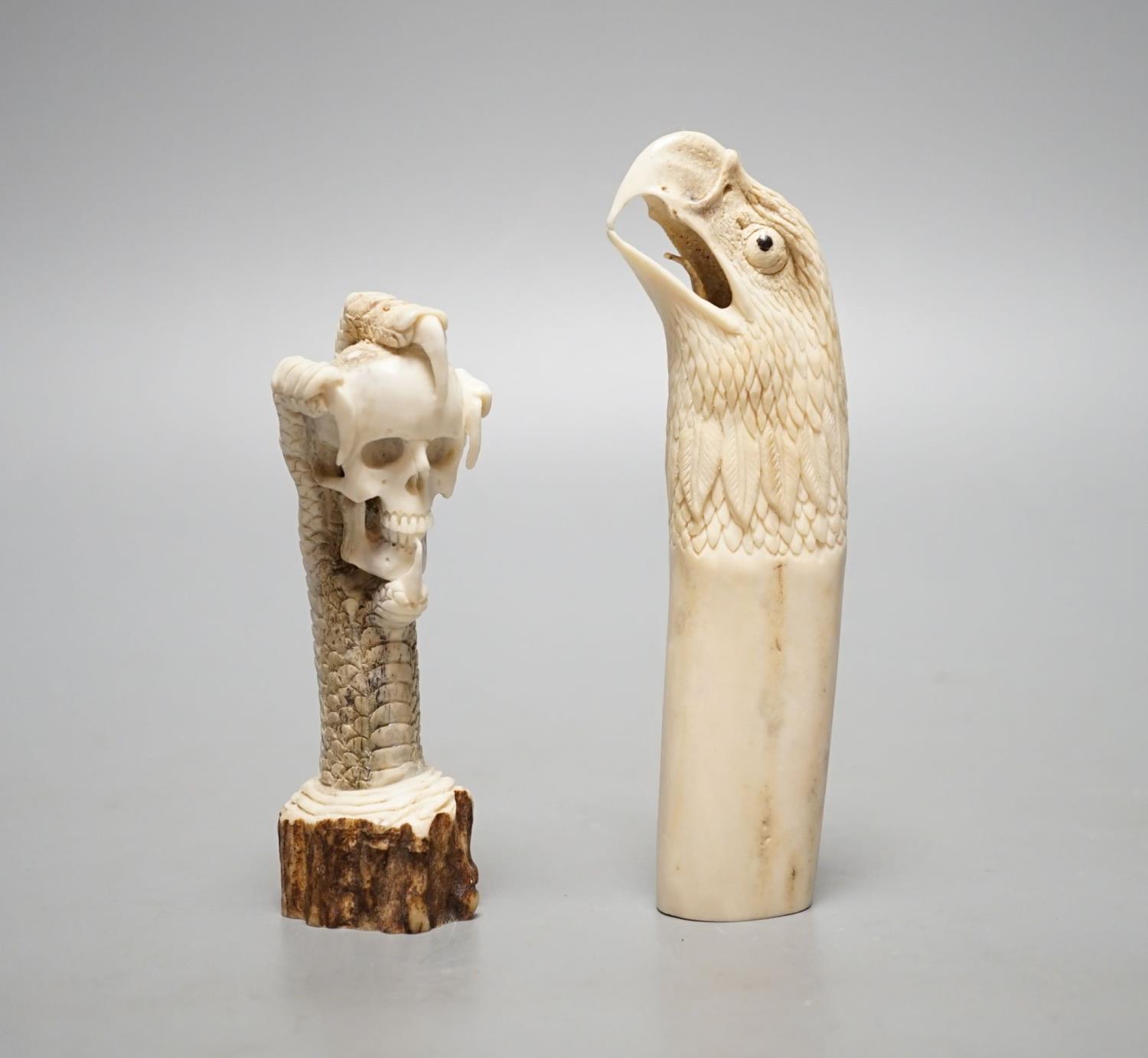 Two Japanese stag horn handles - eagle's head and a memento mori, eagle-head 13.5 cms high.