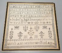 A framed Victorian alphabet sampler by Sarah Ann Seaton Welford, aged 13, 32x33cm