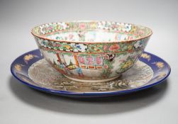 A late 19th century famille rose bowl and a Chinese porcelain dish, bowl 30 cms diameter.