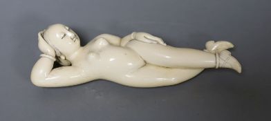 A 19th century Chinese carved ivory medicine doll, 15cm