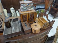 A Victorian oak smoker's box, two olive wood book rests, money box, tray, clock and a cutlery box