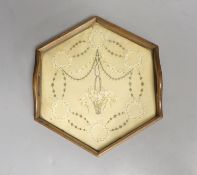 An early Victorian hexagonal tray with ribbon worked embroidery on silk, 25cm