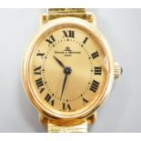 A lady's 18ct gold Baume & Mercier manual wind dress wrist watch, on an associated gold plated