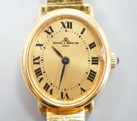 A lady's 18ct gold Baume & Mercier manual wind dress wrist watch, on an associated gold plated