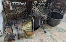 A wrought iron scroll work firescreen, width 95cm, a Dutch embossed brass scuttle, two trivets, coal