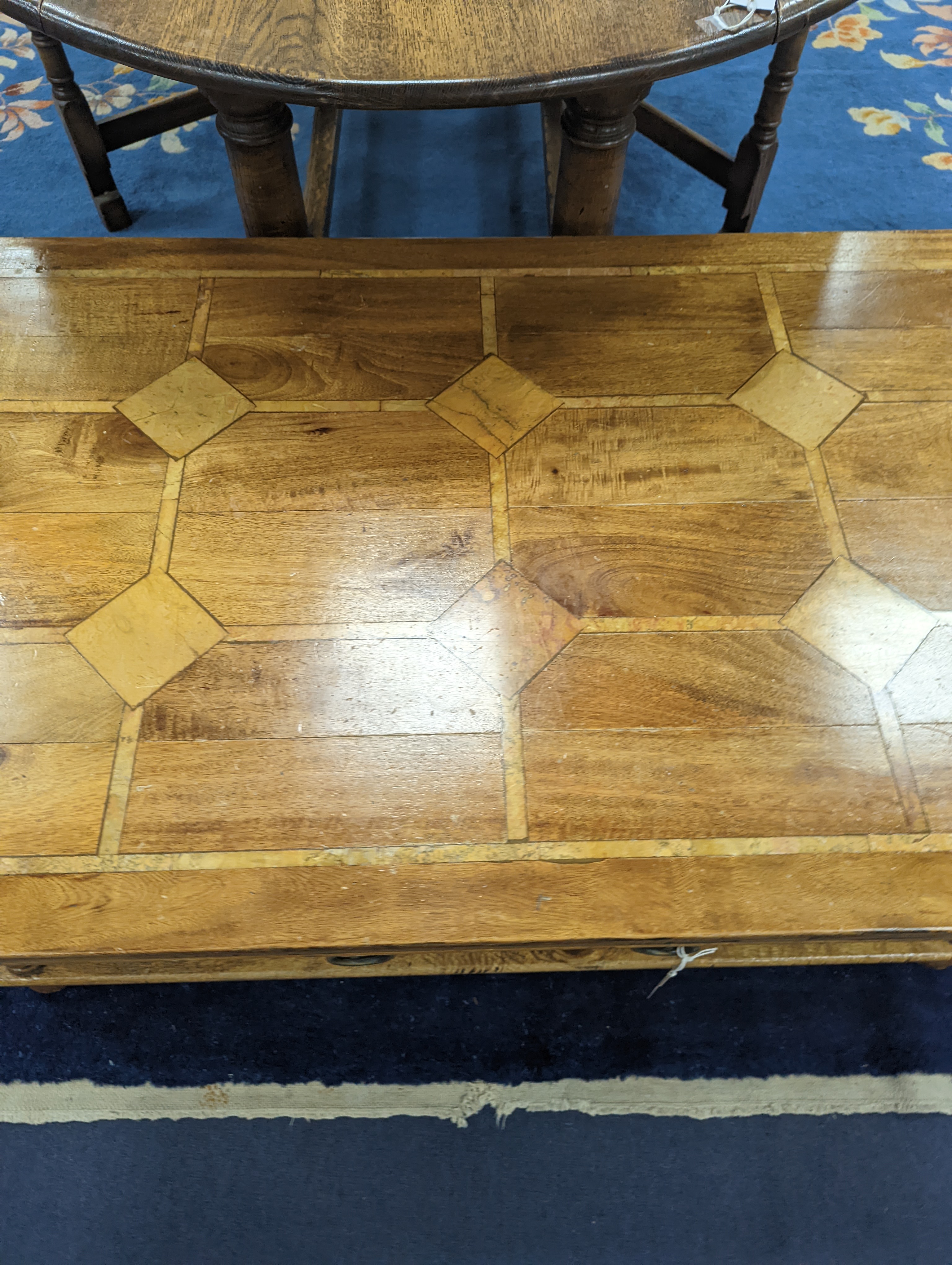 A hardwood and marble inset coffee table, length 130cm, depth 80cm, height 45cm - Image 3 of 7