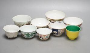 Nine Chinese porcelain tea bowls, tallest 6 cm.