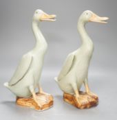 A pair of Chinese celadon glazed geese, 30cm