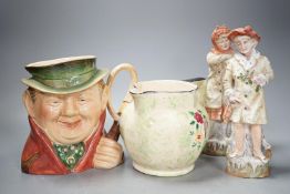 A Royal Doulton character jug and 6 other pieces including a Staffordshire figure group, tallest