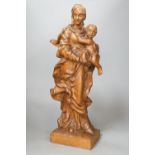 A 19th century carved oak Madonna and child, 49cm