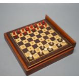 Two boxed chess sets, one turned wood, the other bone