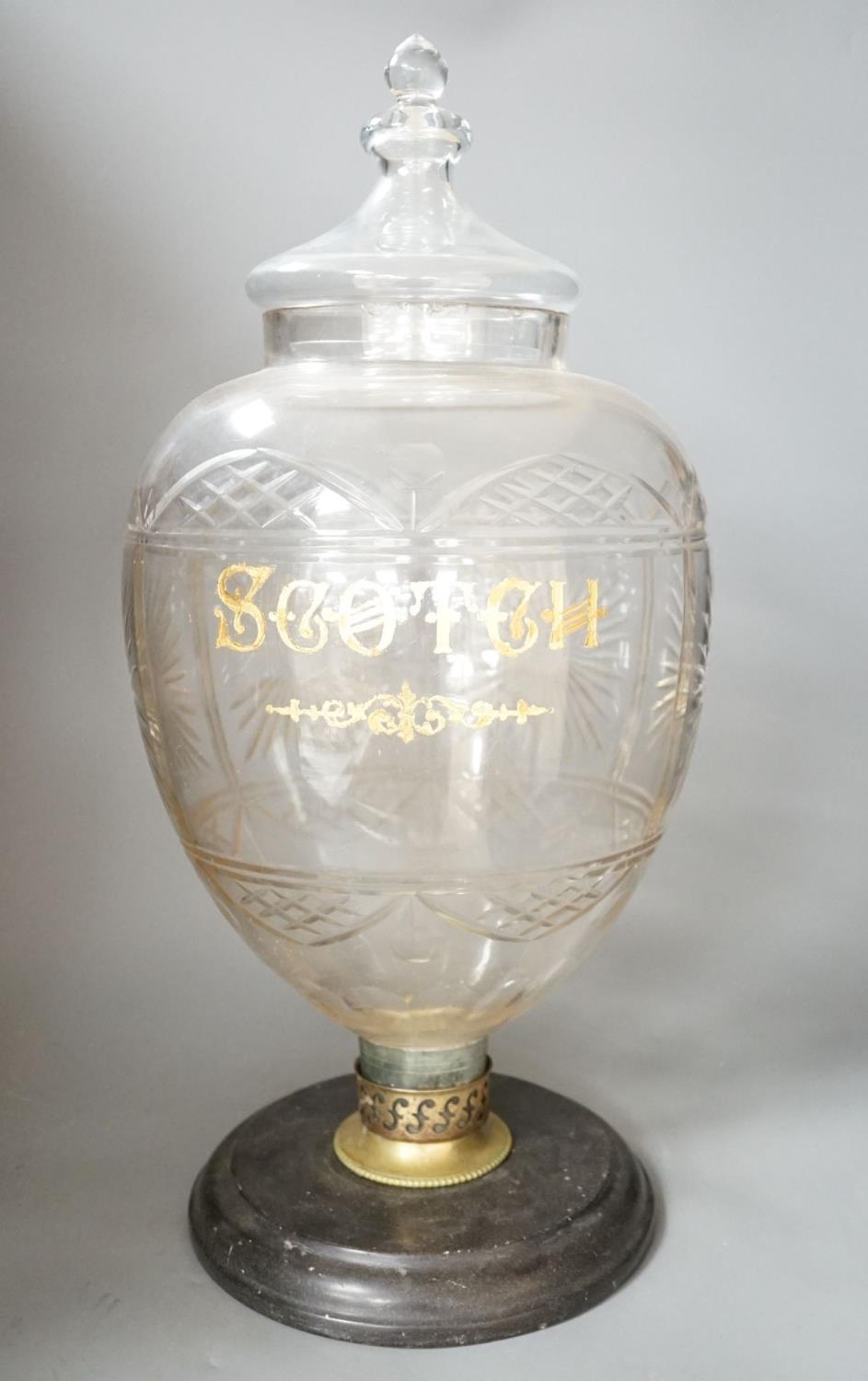 A large cut glass "Scotch" jar, on stand, 54cm