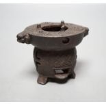 A Japanese cast iron burner stand, 6.5 cms high.