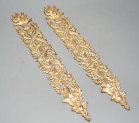 A pair of ormolu furniture mounts, circa 1900, 48cm long