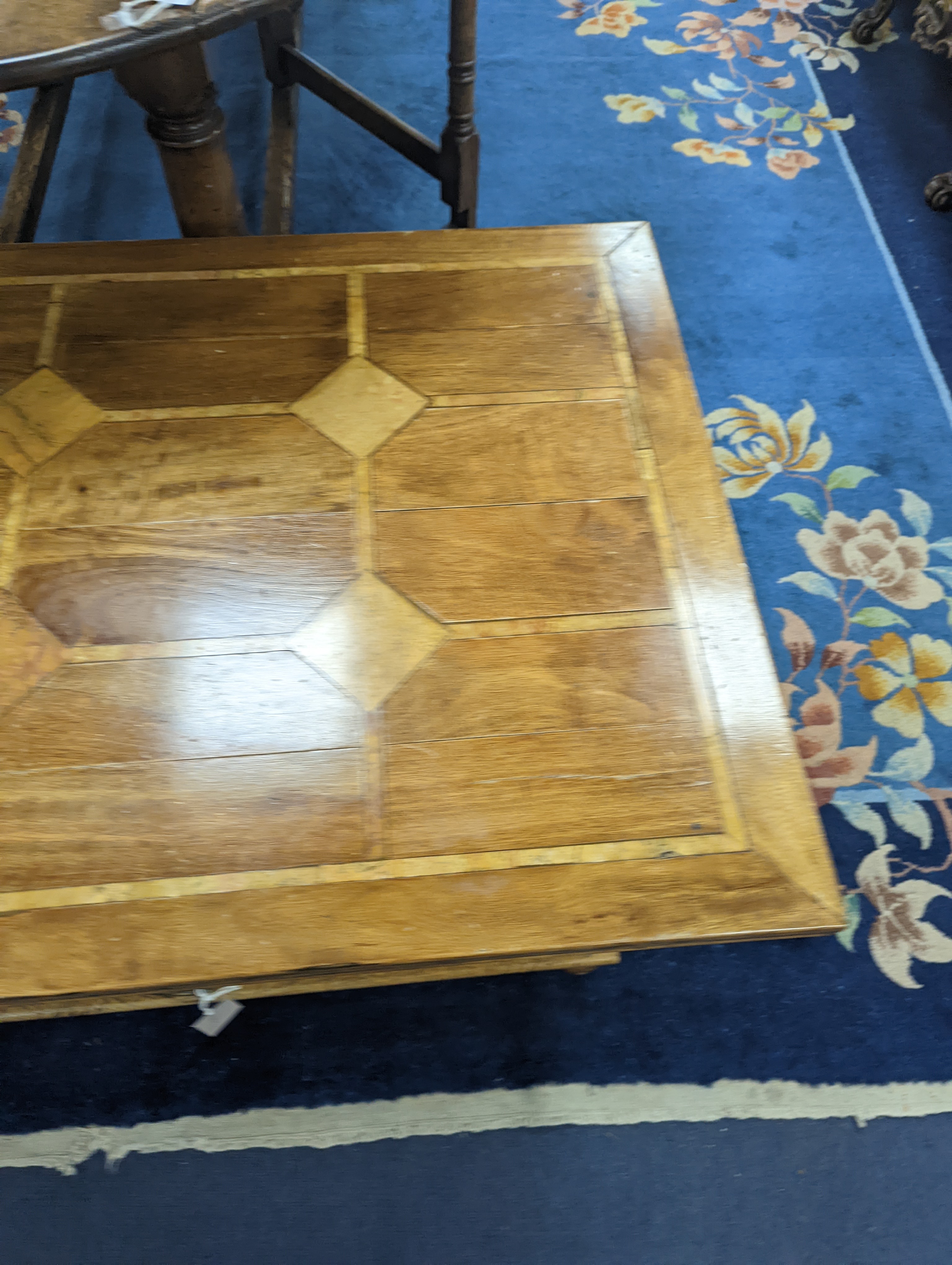 A hardwood and marble inset coffee table, length 130cm, depth 80cm, height 45cm - Image 4 of 7