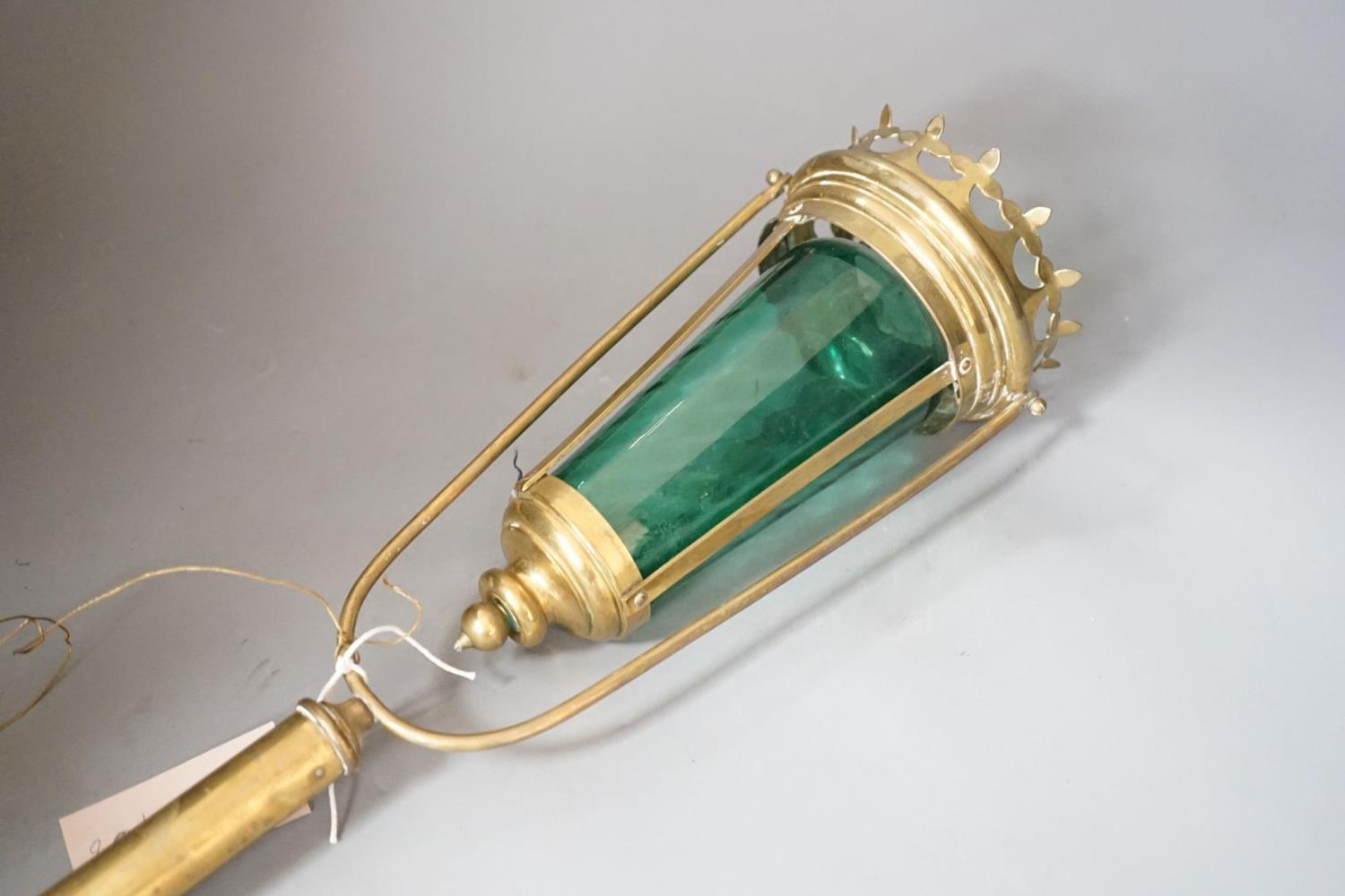 A brass and green glass processional lantern, with docking port,90 cms high. - Image 2 of 2