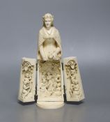 A late 19th century Dieppe ivory triptych figure of Eleanor of Aquitaine, 20 cmher robes opening