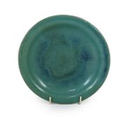 A Chinese Jun style green and blue glazed dish, Shiwan kilns, 18th/19th century,impressed four