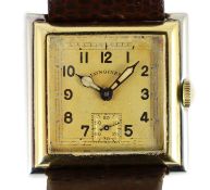 An Art Deco 18ct gold and platinum Longines manual wind square dial wrist watch,with Arabic dial and